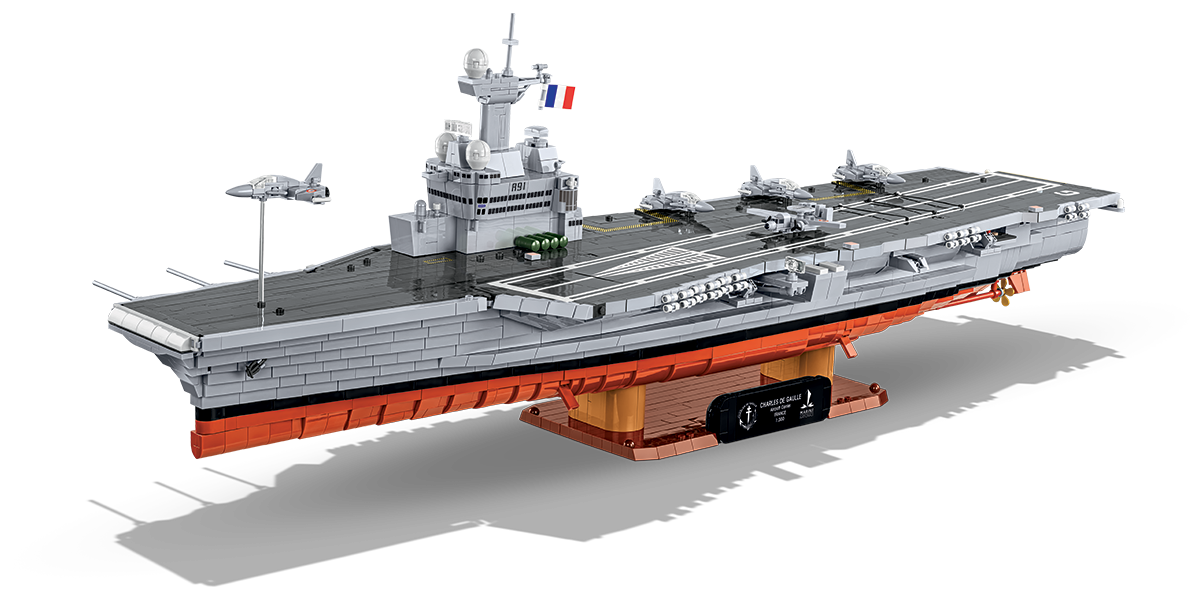 Full view of the Charles de Gaulle aircraft carrier model on a stand with a collector's plaque.